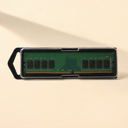 Byteboost – Single green memory module in a clear plastic case with a black pull tab, shown top-down