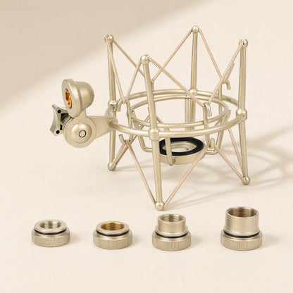 Micsteady Condenser Microphone Shock Mount in champagne gold with four threaded adapter rings in front