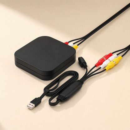Framegrab – Capture cable connected to a black player box via red, white and yellow AV leads, with USB plug at left
