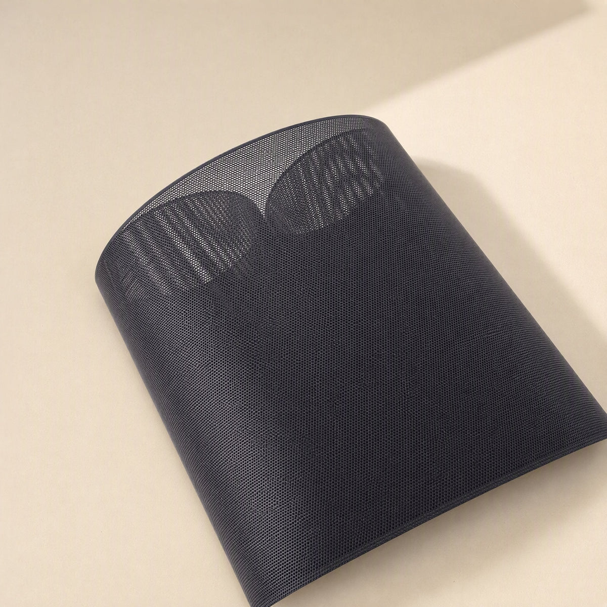 Netshield – Black mesh filter sheet curved upright, with fine weave and two lighter arched patches near the top edge