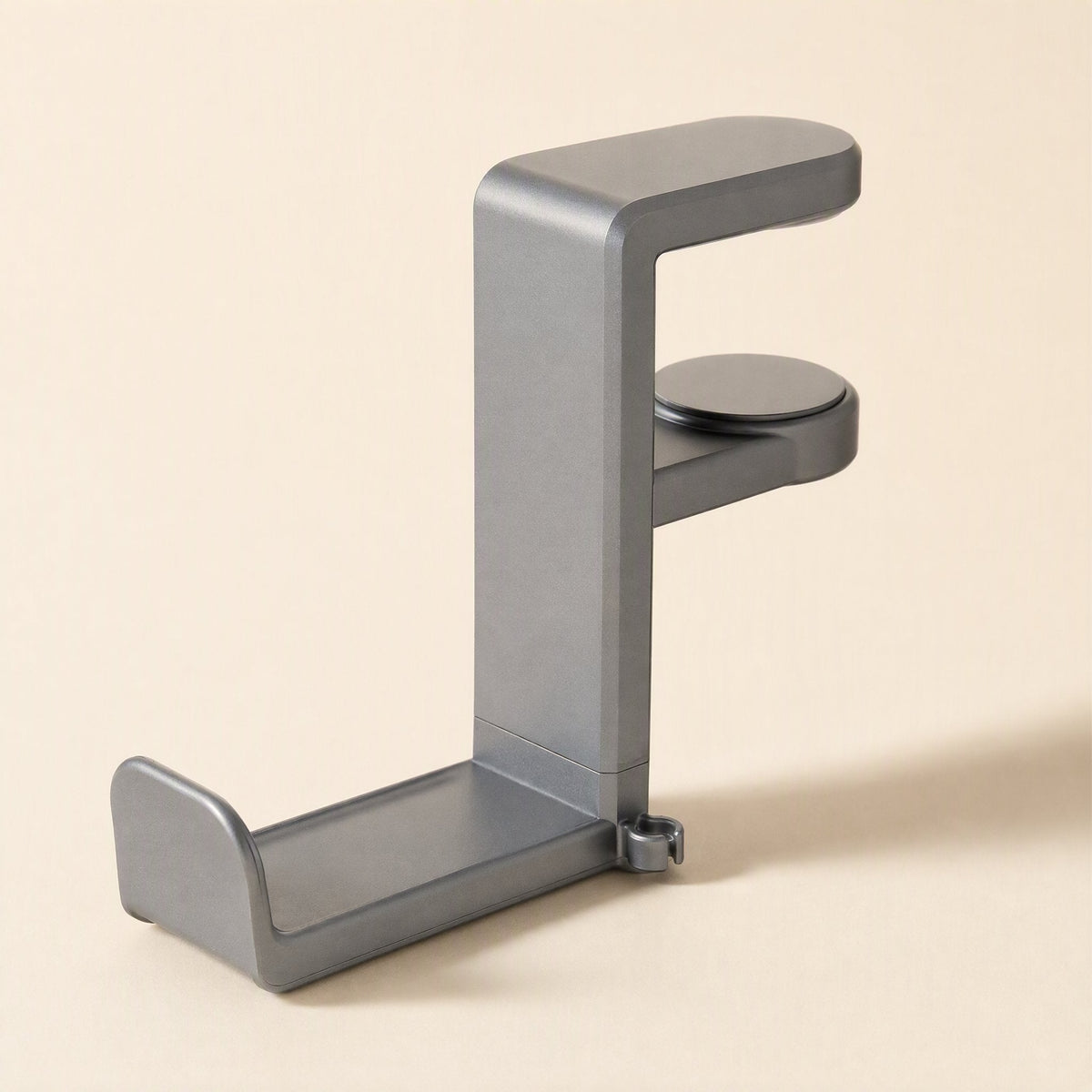 Spinrest – Gray desk clip headphone stand, rear three-quarter view showing the flat hook shelf and rotating clamp pad