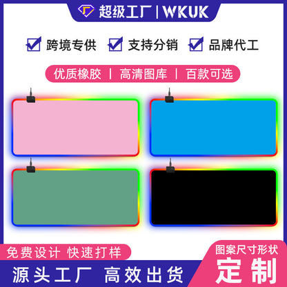 Gleammat RGB LED Mouse Pad in pink, blue, green and black options with rainbow glowing edges and attached cables