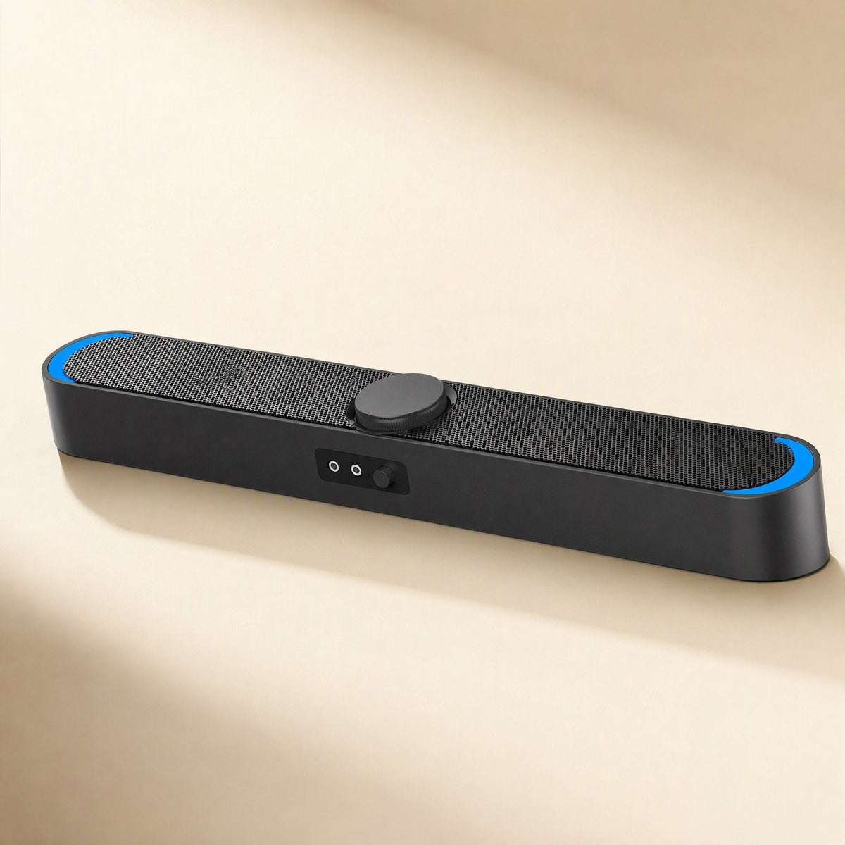 Desksonic USB Desktop Small Speaker, black soundbar with blue end lights, angled view on a beige surface
