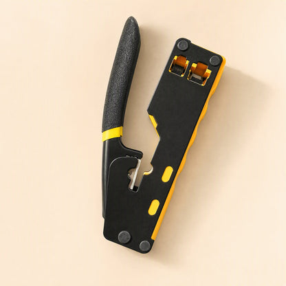 Cablepress – Pliers held upright, showing the textured black handle with a yellow band and the open cutting notch