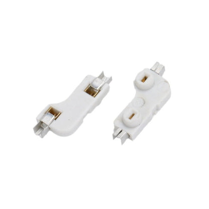 Switchwell – Pair of white hot-swap sockets shown from the top and underside, with metal contact clips visible