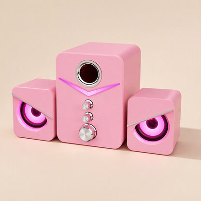 Soundbud – Pink three-piece speaker set with purple LED lighting on the subwoofer and both satellite speakers