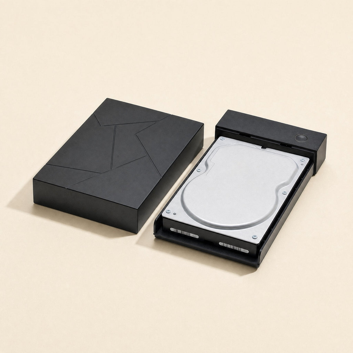 Diskbox 3.5-Inch USB Hard Disk Box – open black hard disk box beside its lid with a 3.5-inch hard drive seated in the tray