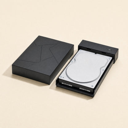 Diskbox 3.5-Inch USB Hard Disk Box – open black hard disk box beside its lid with a 3.5-inch hard drive seated in the tray