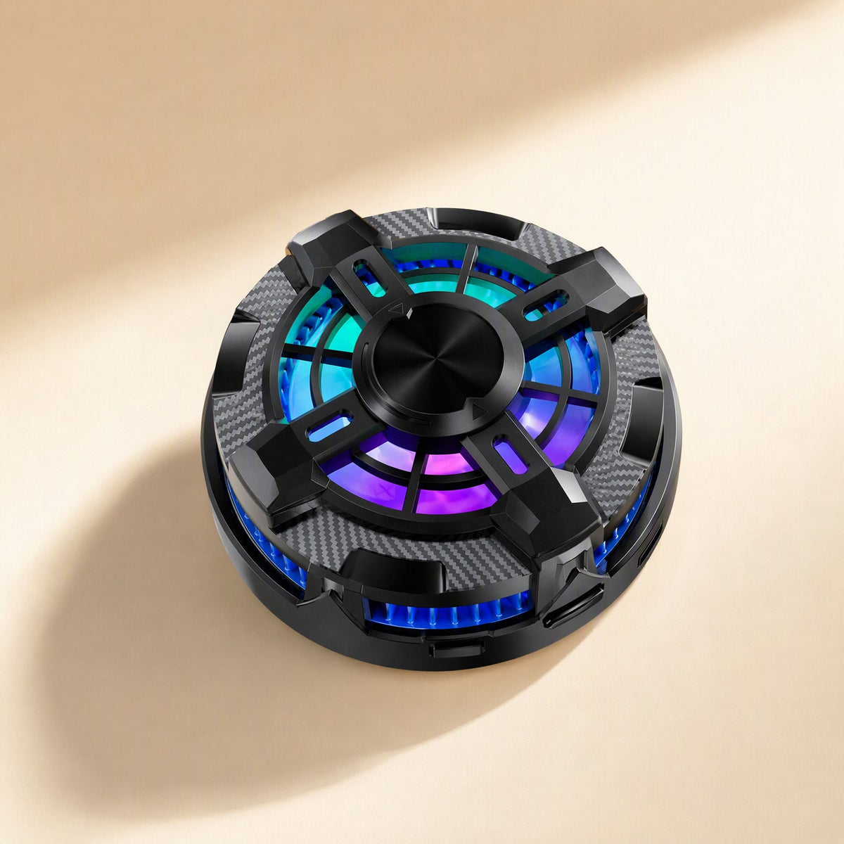 Chipfrost mobile phone radiator in black with carbon-fiber trim and a glowing blue and purple fan, top-down view