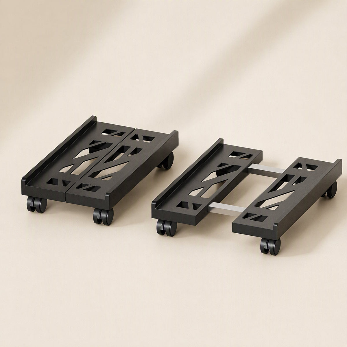 Towerroll – Two black racks side by side, one collapsed and one extended with silver crossbars visible