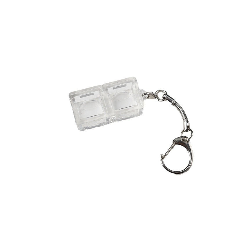 Keyloop – Clear 2-slot switch keychain with a silver clasp and spring chain on a white background