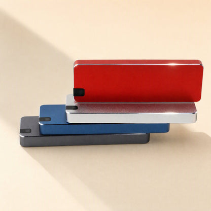 Bytecarry Portable Metal SSD – red, silver, blue and gray portable SSDs stacked in a staggered pile, seen from the side