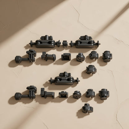 Armanchor – Disassembled black magic arm parts, ball-joint arms, clamps and screw adapters, arranged in rows