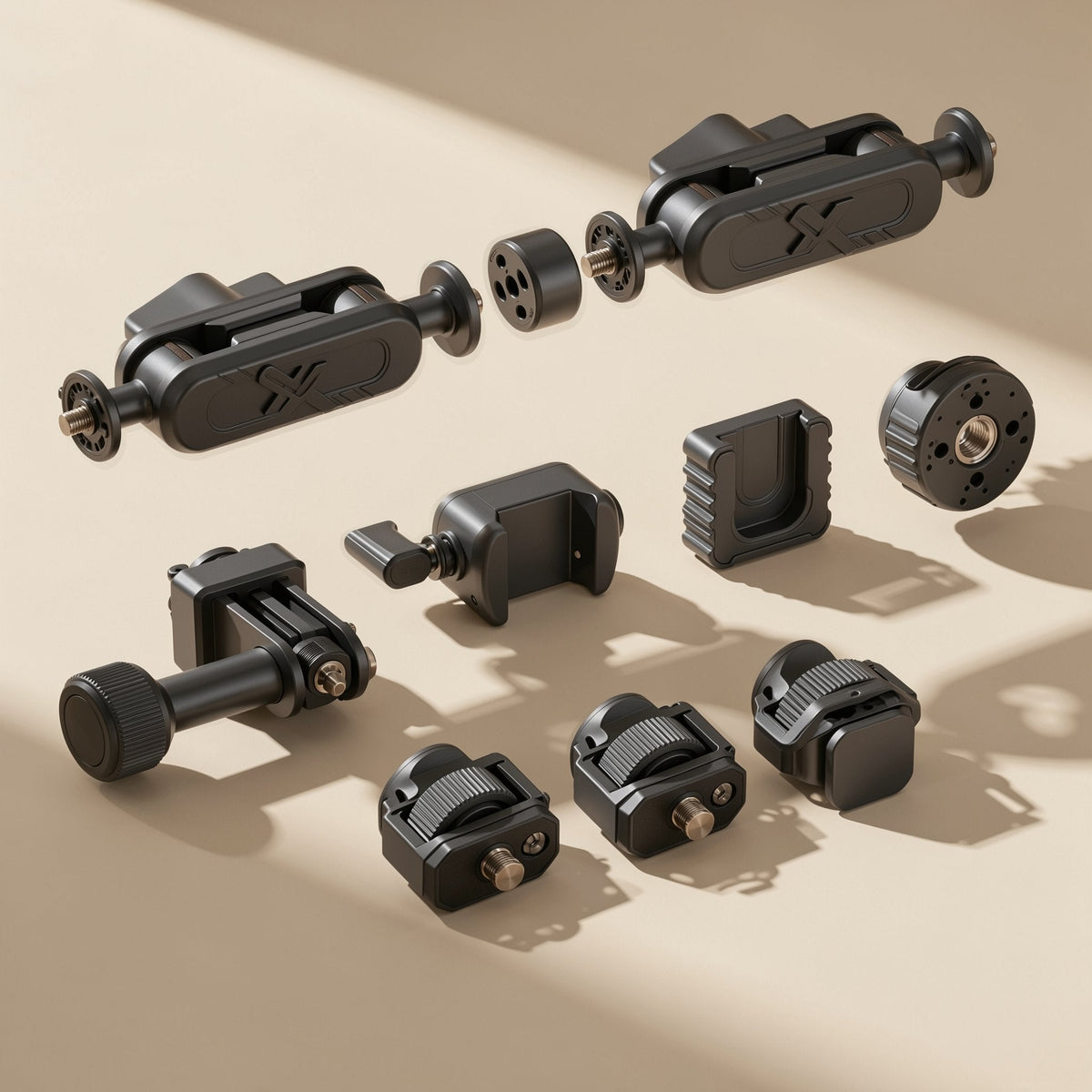 Armanchor – Magic arm mount components, two arms, phone clamps and cold-shoe adapters, scattered in sunlight