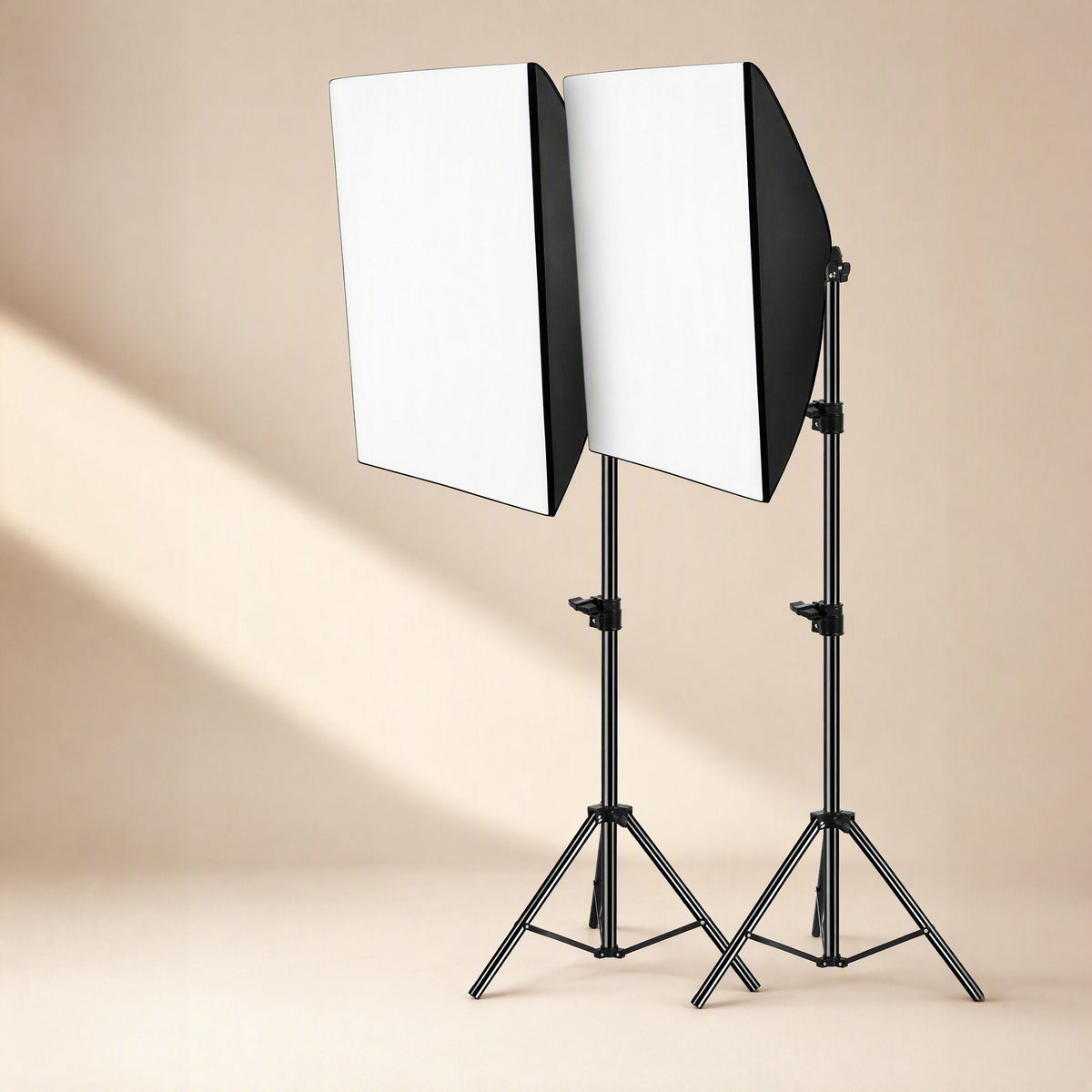 Faceglow Live Streaming LED Fill Light kit with two softboxes on tripod stands against a beige backdrop