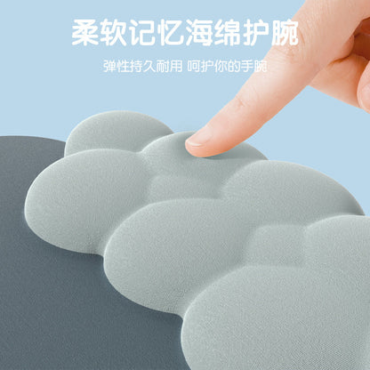 Wristnest – Fingertip pressing the soft gray-green cloud wrist rest on a mouse pad, with Chinese text about memory sponge