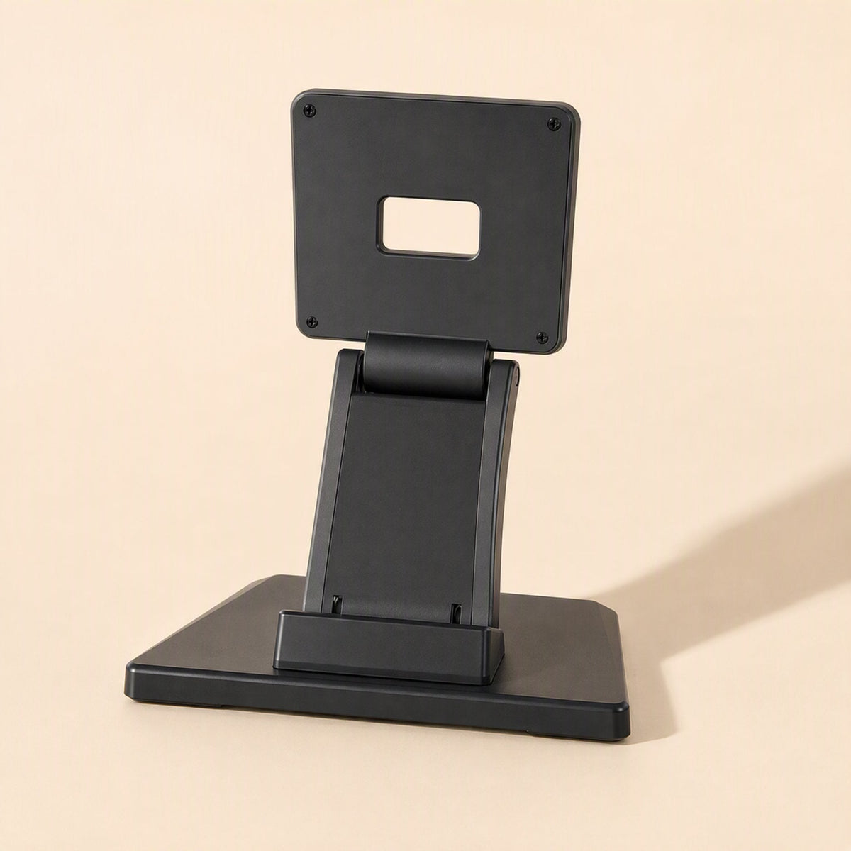 Viewtilt Folding Monitor Stand – rear view of the black steel stand with its mounting plate raised on a flat base