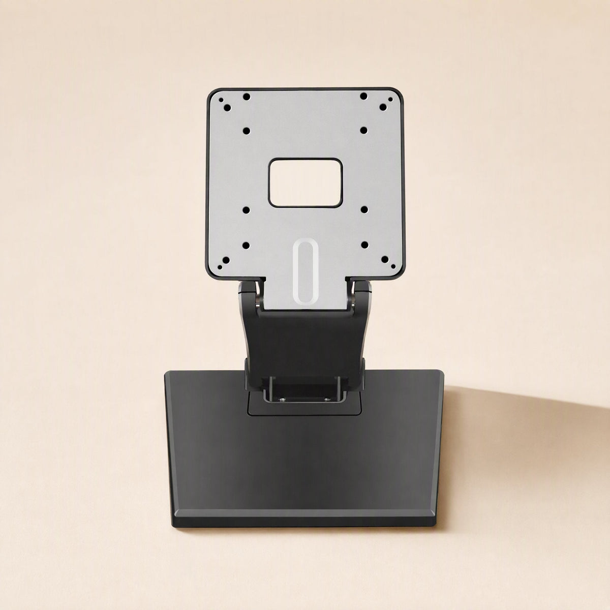 Viewtilt – Front view of the upright stand showing the grey mounting plate with screw holes and a center cutout