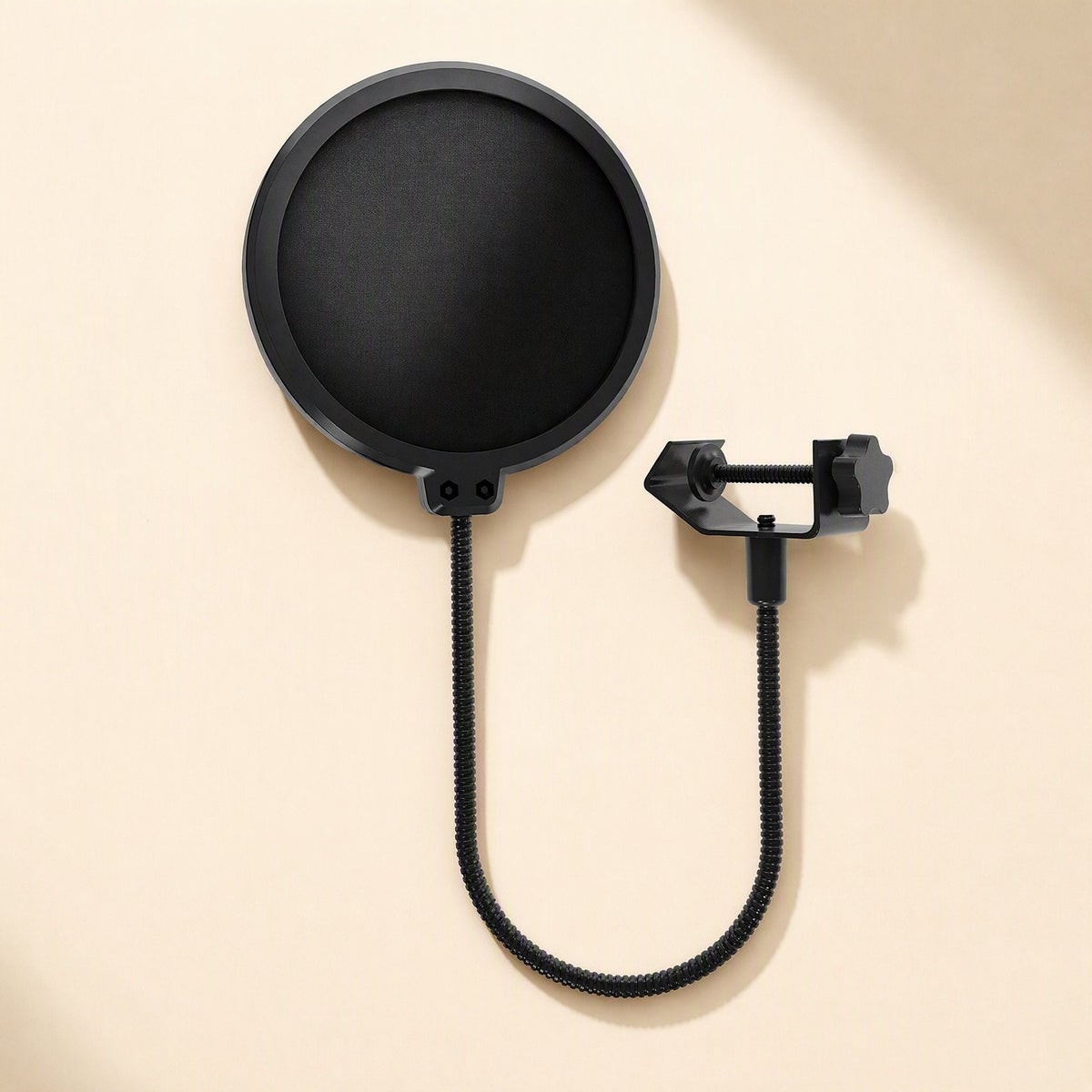 Meshhush Double-Layer Mesh Microphone Pop Filter with gooseneck arm and clamp on a cream background