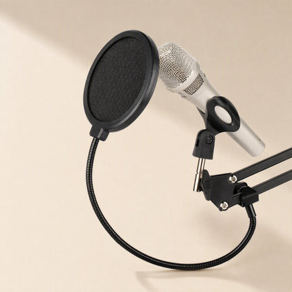 Meshhush – Black round pop filter on a gooseneck arm positioned in front of a silver handheld microphone on a boom stand