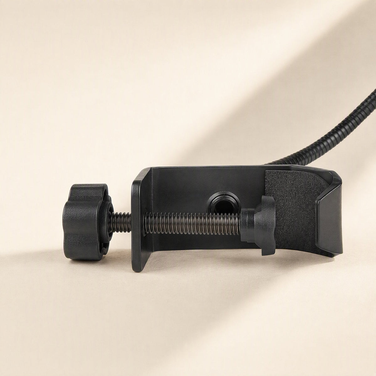Meshhush – Close-up of the black C-clamp with thumb screws and threaded hole at the base of the gooseneck arm