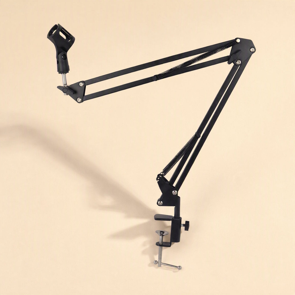 Voicebrace – Angled view of the black spring arm with microphone clip raised and clamp fixed at the base