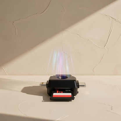 Typeport – Black card reader with a red-labeled 1TB memory card inserted and light streaks rising from the top