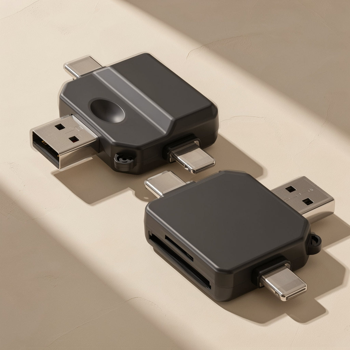Typeport – Two gray card readers with USB-A, Type-C and Lightning plugs and SD and TF card slots on a beige surface