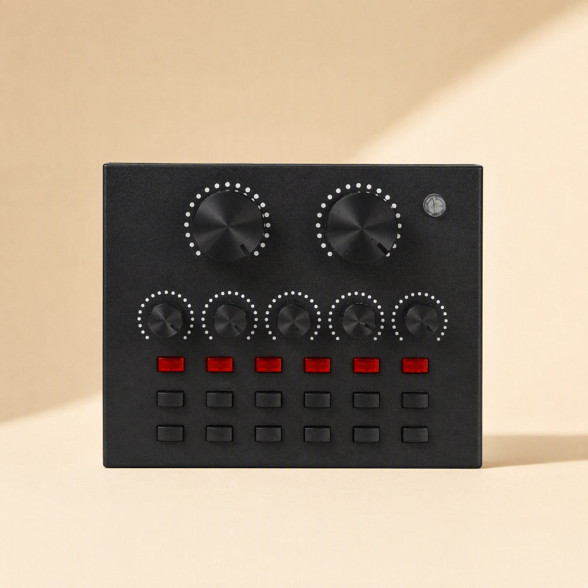 Soundweave – Front view of the black sound card with two large dials, five small knobs and red and black buttons
