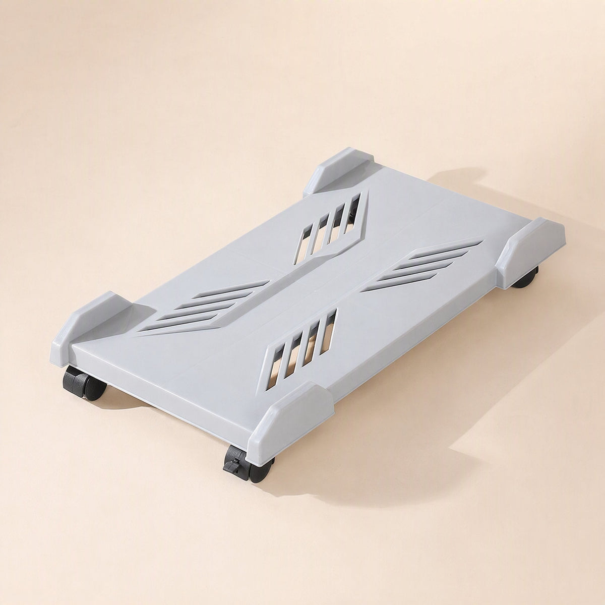 Deskroll – Light grey wheeled computer stand, top view with angled vent slots and four corner brackets
