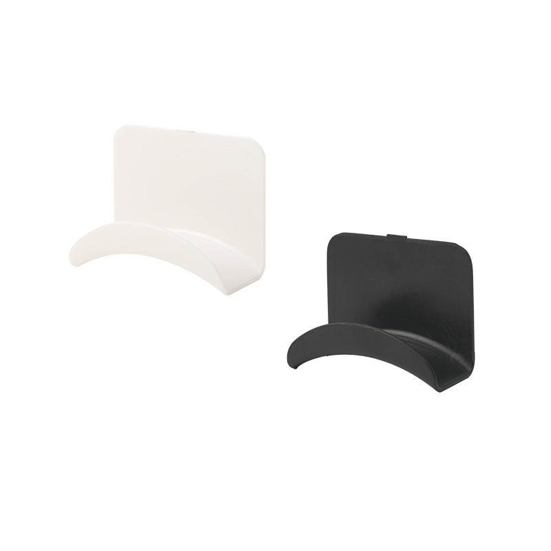 White and black curved headset holders shown side by side on a white background
