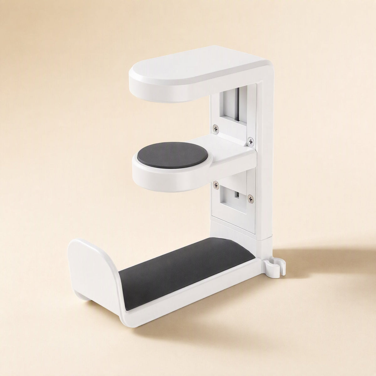 Twinhook – White version of the stand with grey rubber pads on both hooks and the lower rest, shown at a three-quarter angle
