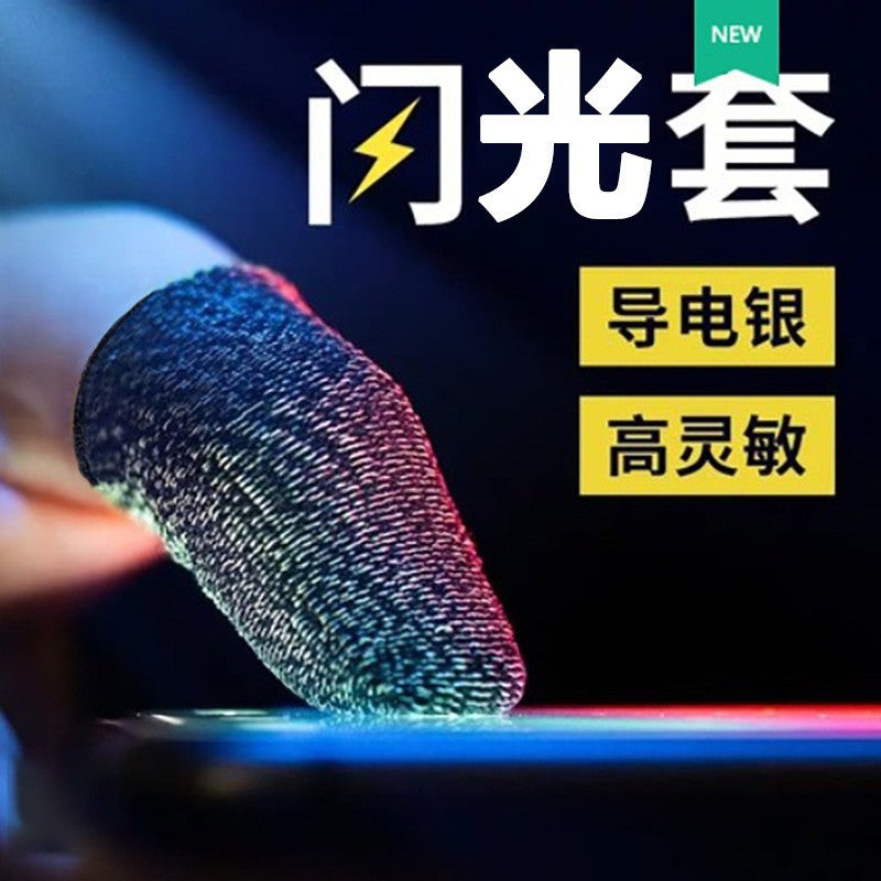 Touchcot Touch Screen Gaming Finger Cover, a black woven fingertip sleeve pressed on a glowing phone screen