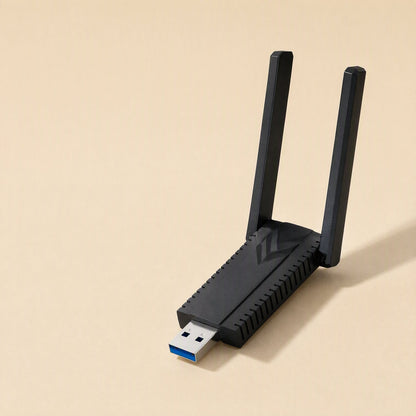 Bandreach – Front view of the adapter standing with both antennas upright, showing the chevron pattern on its top panel