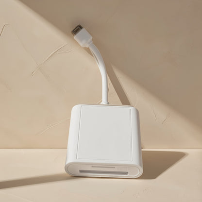 Portread – White card reader standing upright, showing its flat back panel and short cable with a connector on top