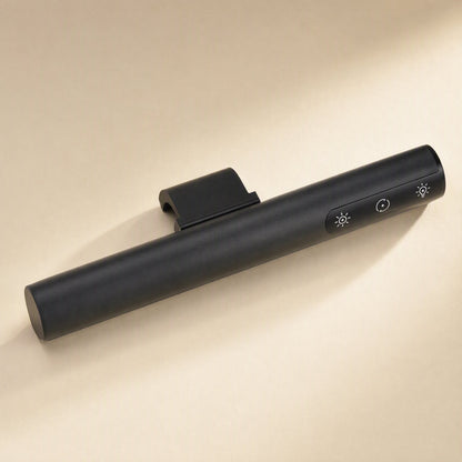 Glowhang – Close-up of the lamp's end with three touch-control icons on the black body and the clip on top