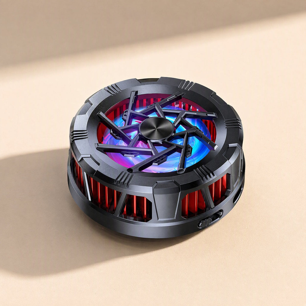 Chillback Magnetic Phone Radiator seen from above at an angle, showing its fan with blue and purple glow