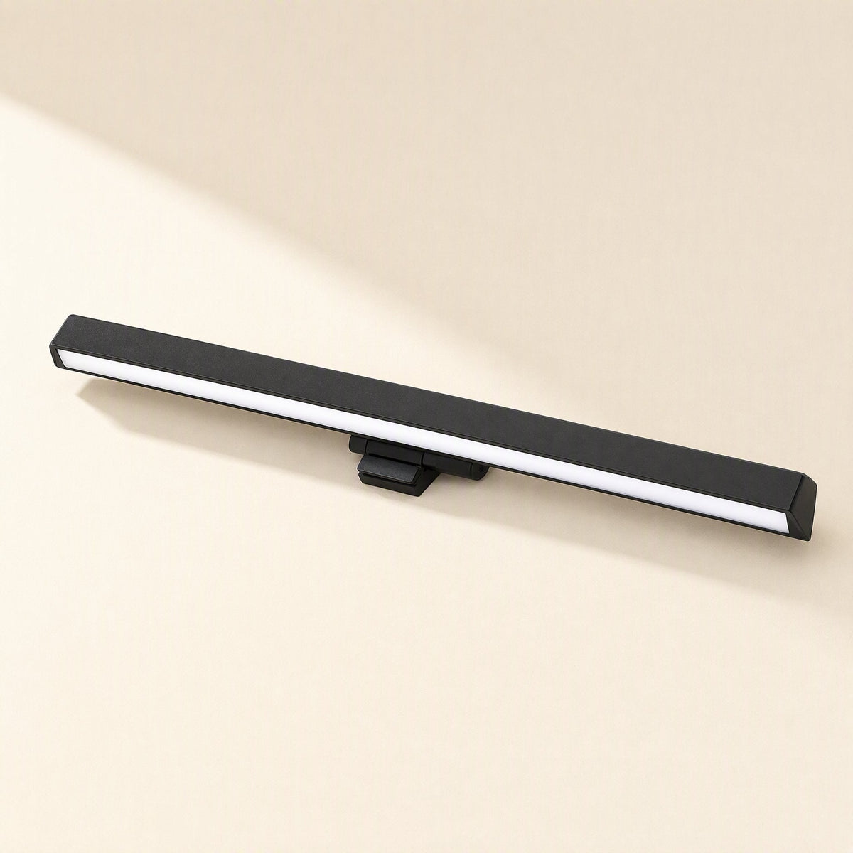 Dimperch – Black monitor light bar angled from the side, with the bright white LED strip visible along its length