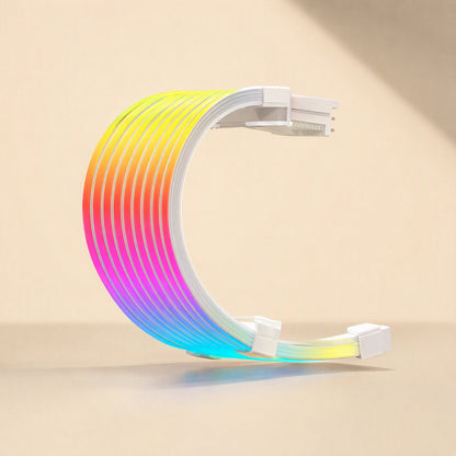 Glowgrid – Curved rainbow neon cable with white connector ends, standing upright on a beige surface