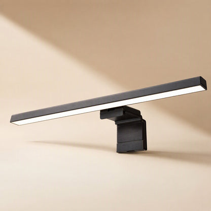 Metalshade – Straight black monitor light bar with illuminated underside and a squared clip, side view