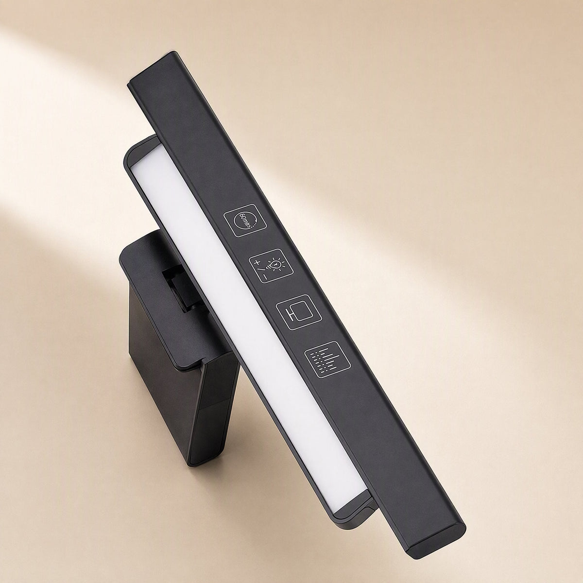 Metalshade – Top of the black light bar showing four touch control icons, with the clip and glowing panel below