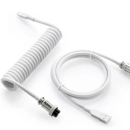 Coilaire Spiral Spring USB-C Keyboard Cable in white, coiled section beside a looped straight section