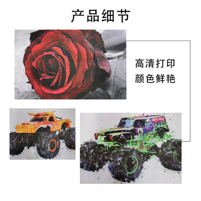 Gamecanvas – Close-up detail of printed canvases showing a red rose and two monster trucks in vivid colour