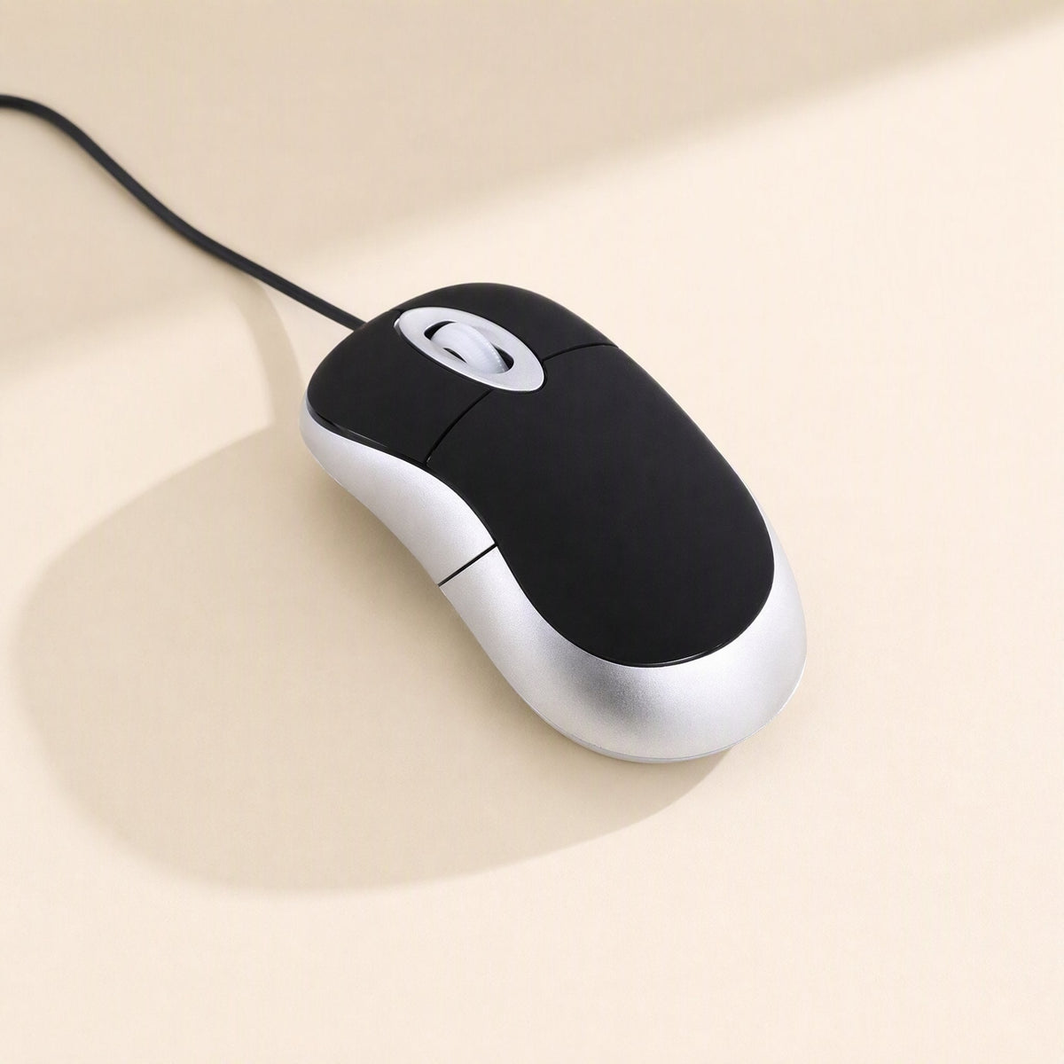 Miniclick Mini Wired USB Mouse – black mini mouse with silver sides and scroll wheel, cable trailing off the top-left corner