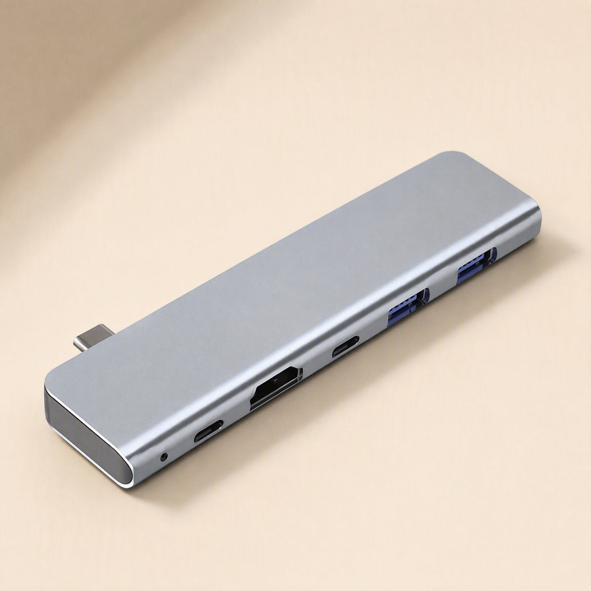 Portpocket 5-in-1 USB 3.1 docking station in space gray, angled view showing HDMI, USB-C and two USB-A ports