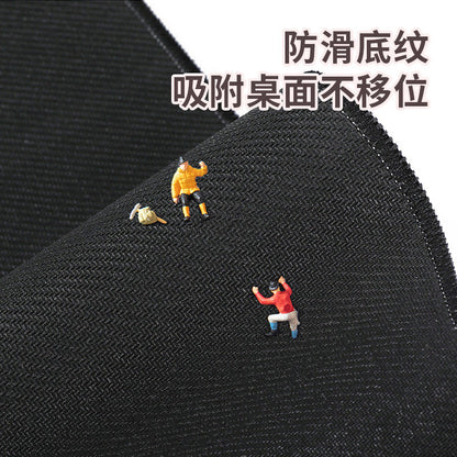 Pupmat Cartoon Puppy Mouse Pad – close-up of the black textured non-slip underside with tiny figurines standing on the fabric
