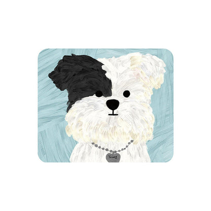 Pupmat – White and black puppy with a heart-shaped tag on a pale blue mouse pad, shown on a plain white background