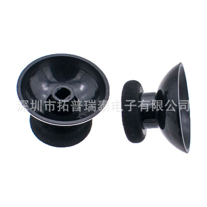 Capnub – Black joystick caps viewed from below showing the hollow socket and a side profile with knurled grip