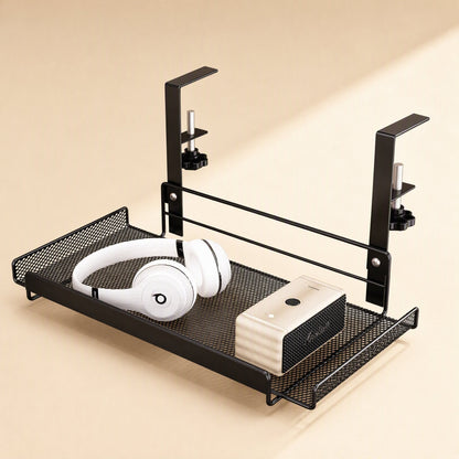 Wireperch – Mesh tray holding white over-ear headphones and a small cream speaker, clamped brackets visible above