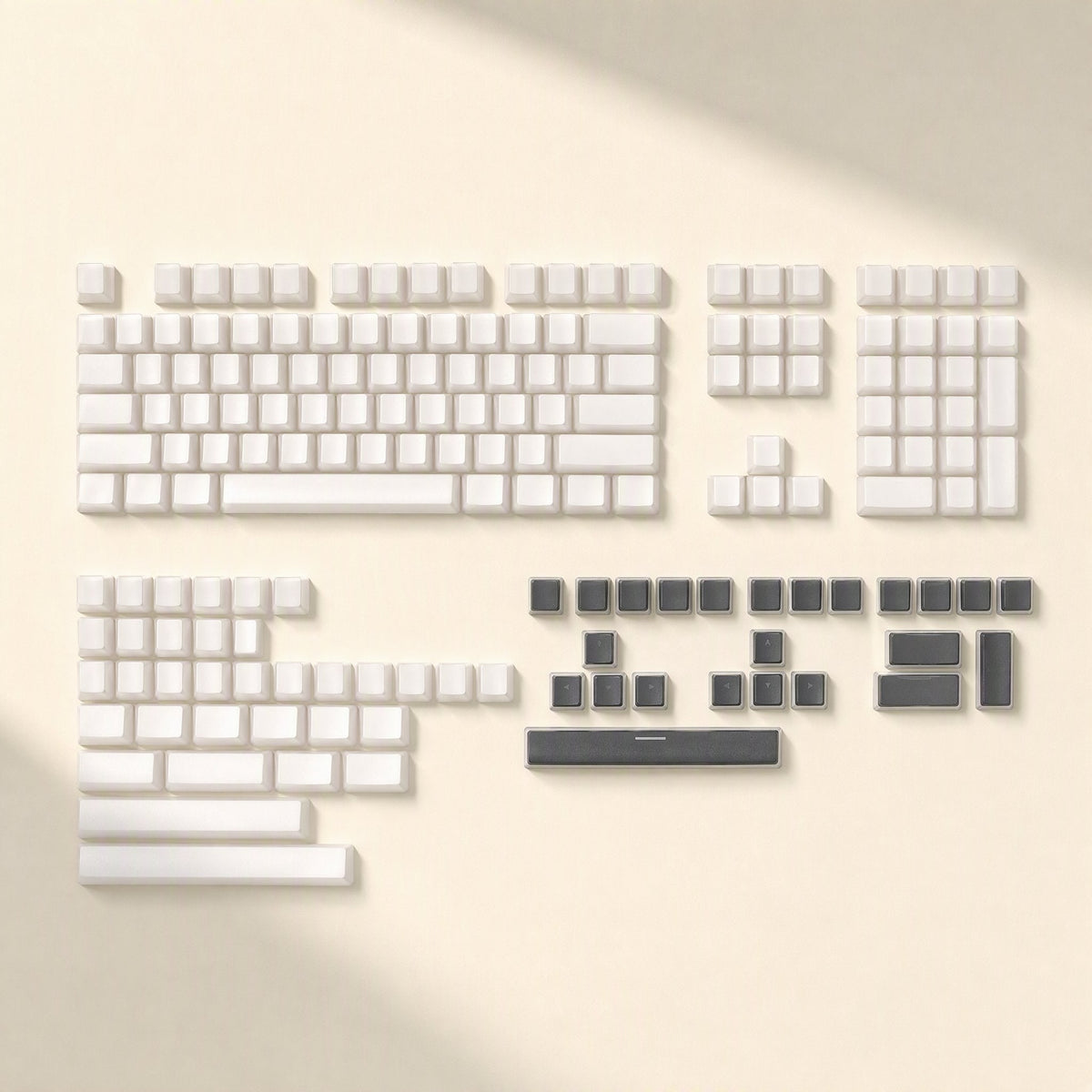 Keyshimmer – Full 165-key set laid out flat: white alphanumeric, numpad and modifier keys with dark gray accent keys